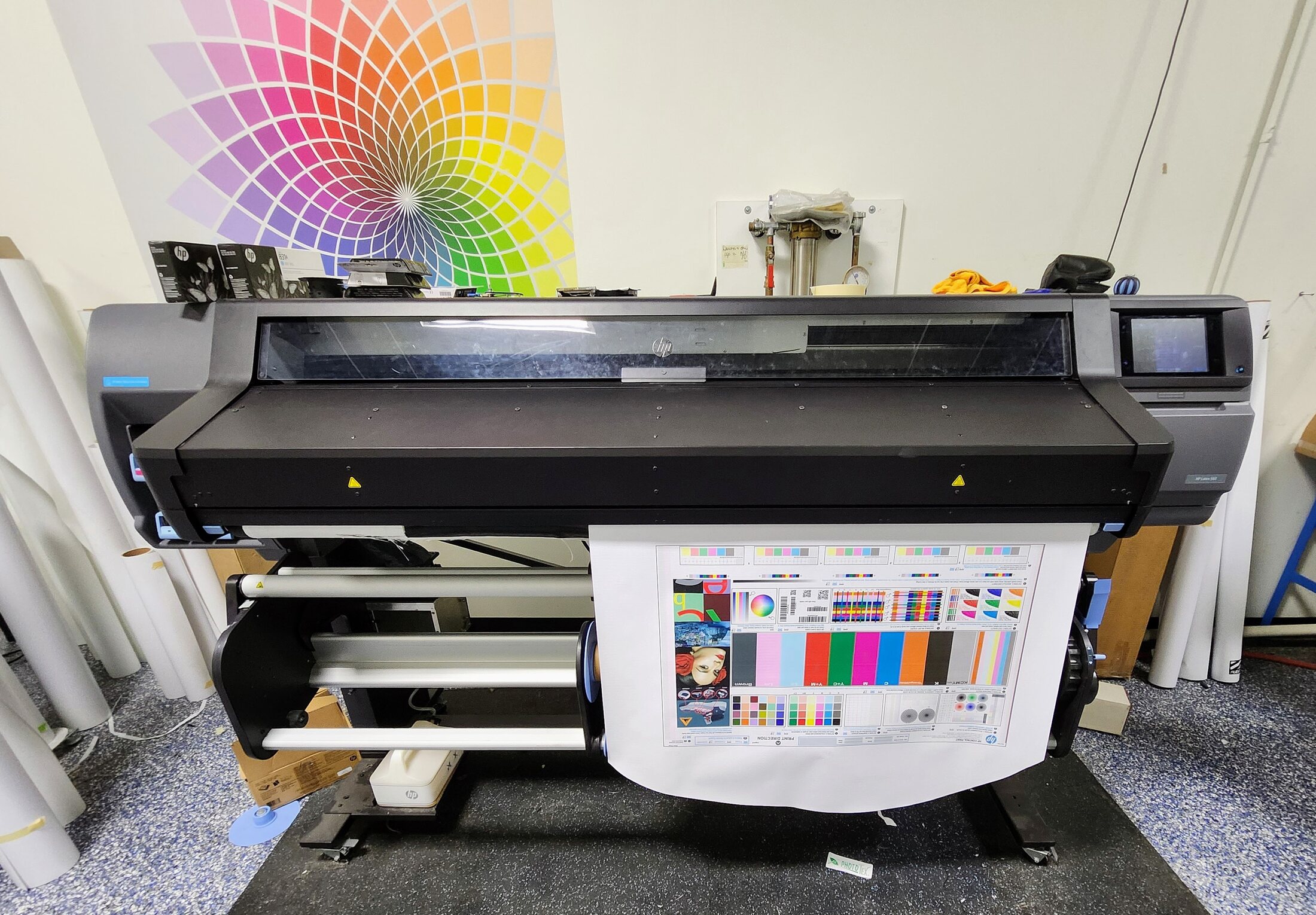 Wide-format printer producing a calibrated color test